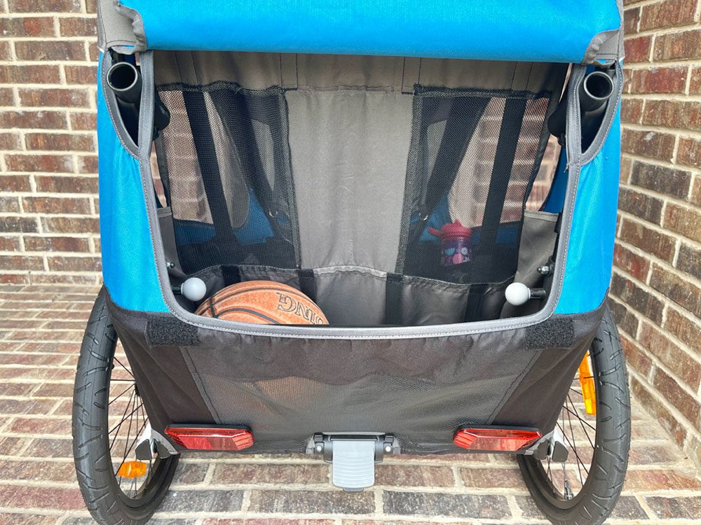 Rear storage of Hamax Traveller, showing basketball inside
