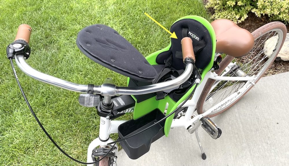 image showing the swept back handlebars hitting the weeride kangaroo child bike seat