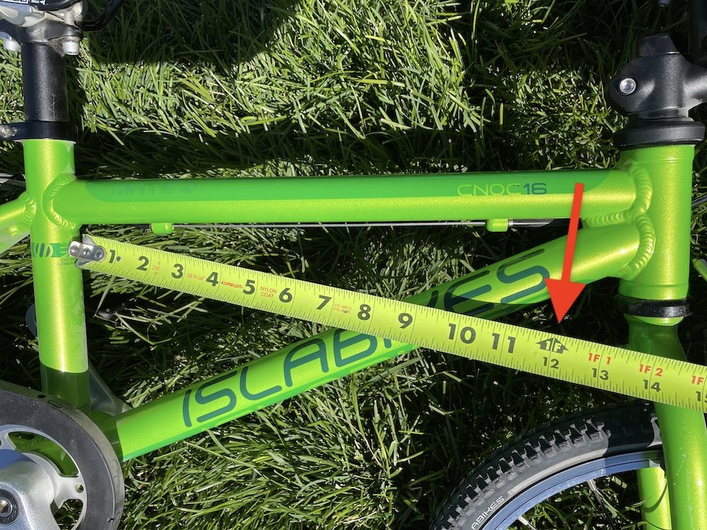 measuring a 16" bike to see if it will fit on a trunk rack