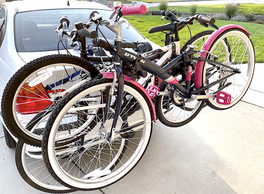 Bike rack for car trunks loaded with three bikes
