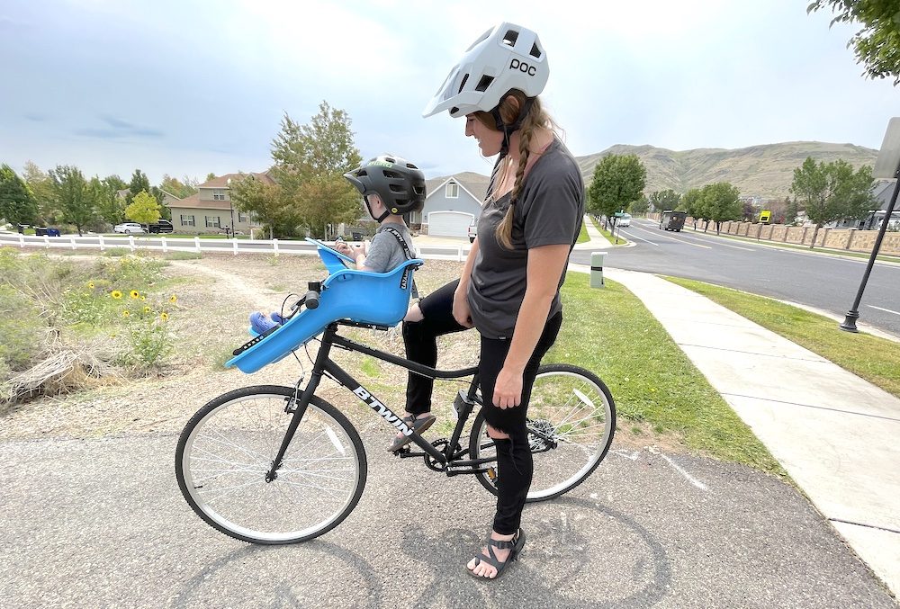 mom riding with her son in the kazam ibert child bike seat
