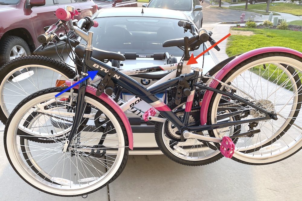 three bikes loaded on the Thule Passage, including two kids bikes