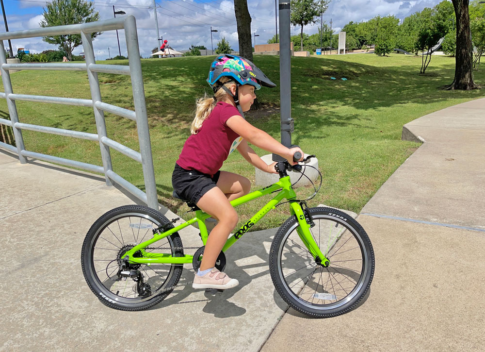 Child riding the Frog 52 and taking a sharp turn