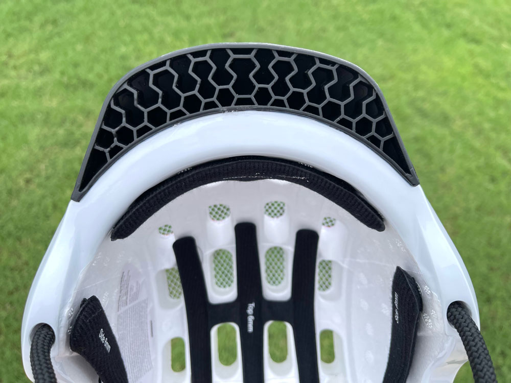 underside of rubber visor on woom kids helmet