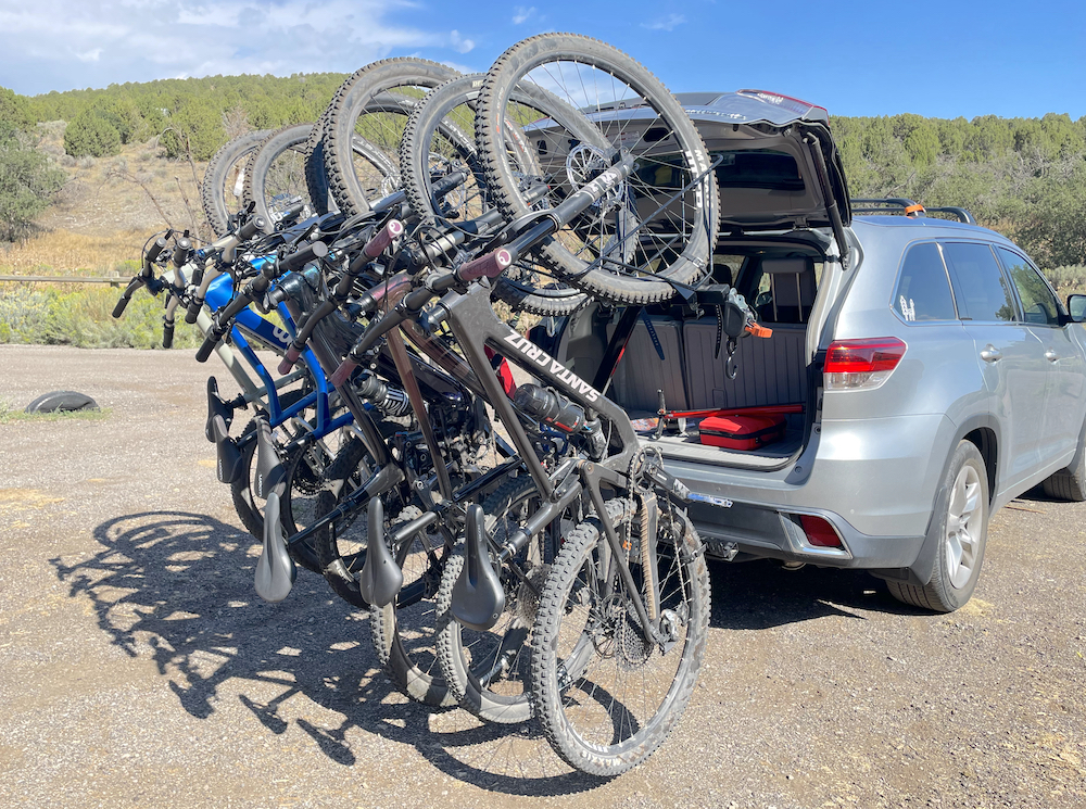 Alta loaded up with 6 bikes tilted down to allow for rear hatch access