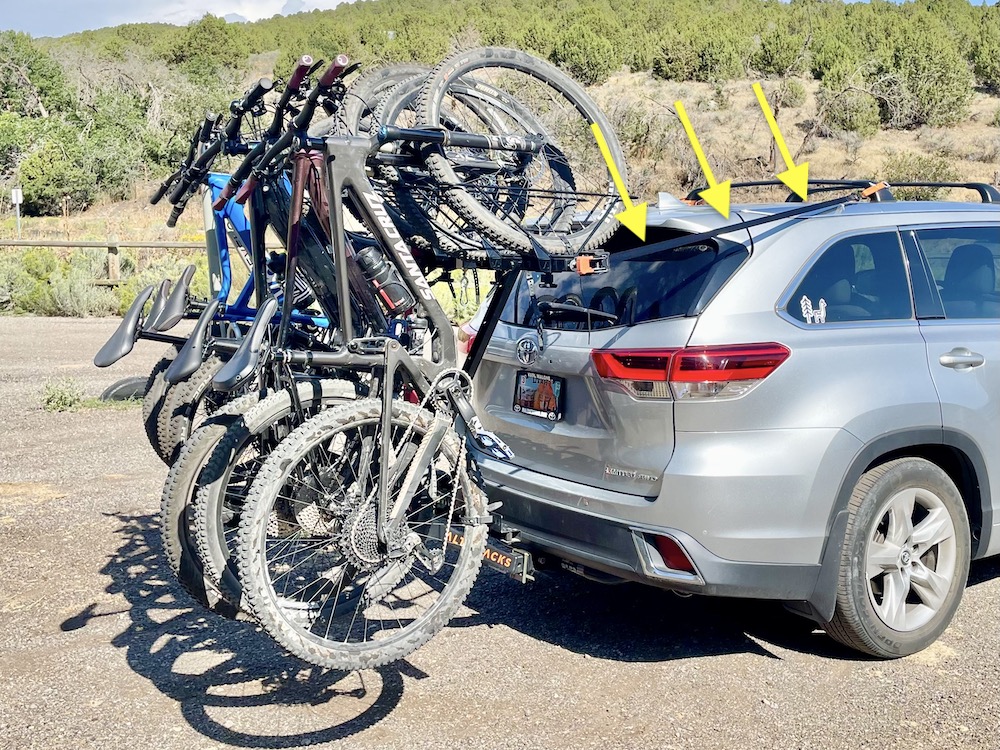 Alta bike rack loaded on a toyota highlander with the retractable straps