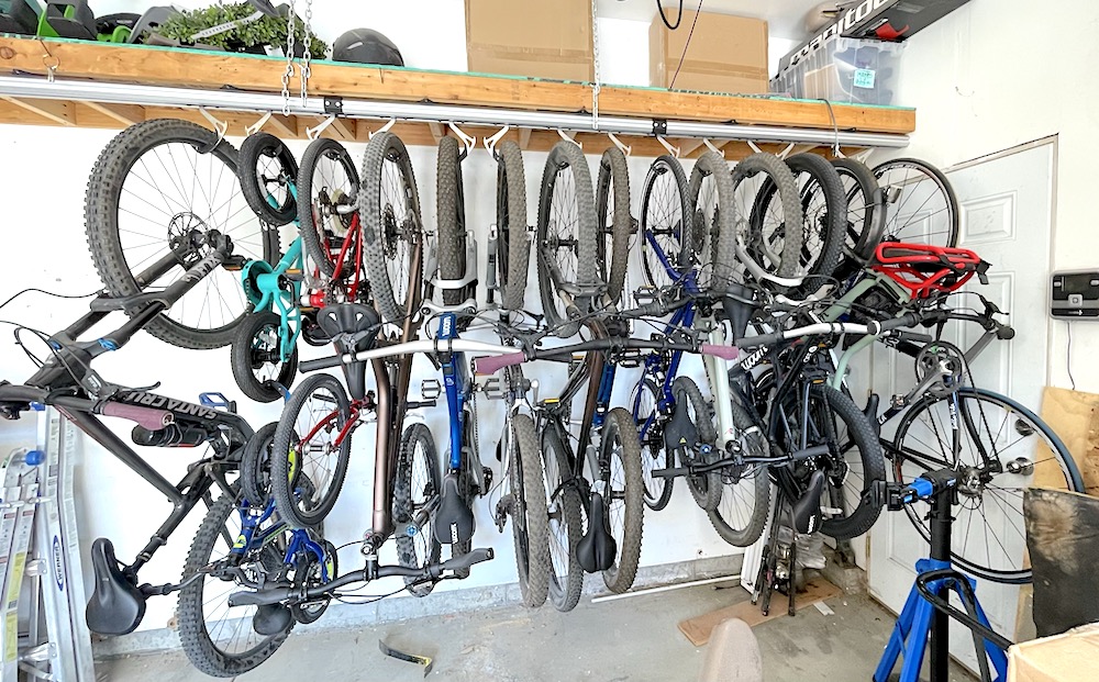 SpaceRail ceiling vertical bike rack system fully loaded