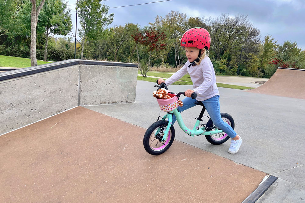 guardian balance bike going down a hill at a skate park