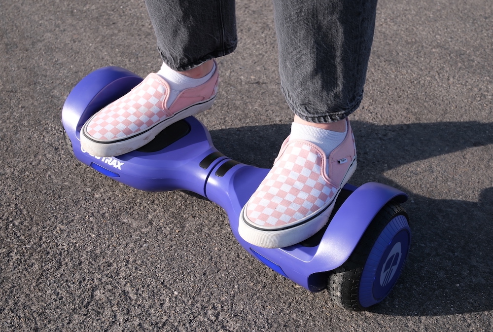 GoTrax Edge hoverboard, ridden by girl
