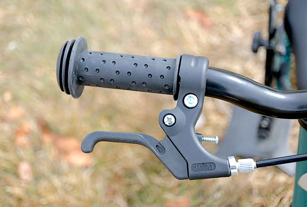 close up image of the brake and grip of the Cub Plus balance bike