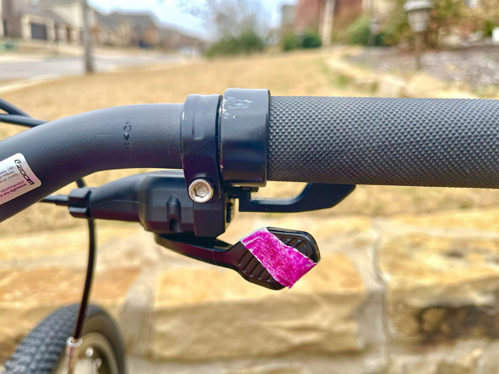 Trigger shifter button with pink tape on Prevelo Alpha Three