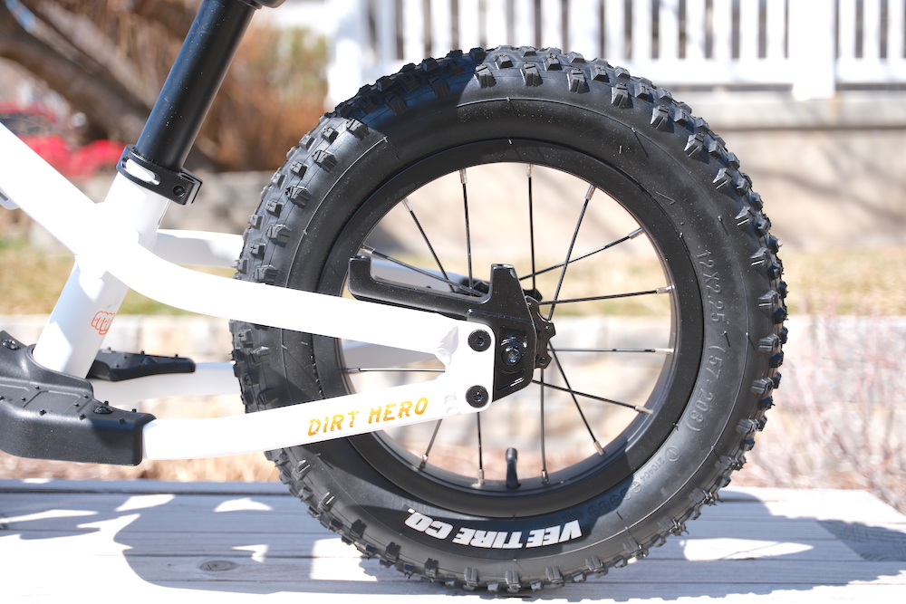 Chunky rear tires on the Kids Ride Shotgun Dirt Hero balance bike