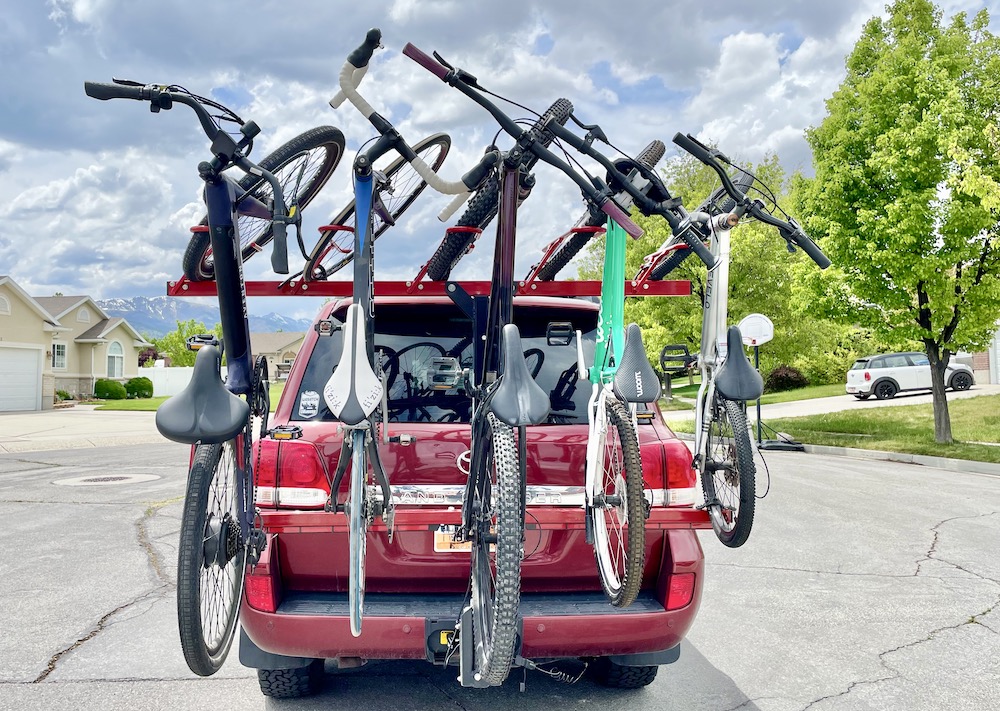 VelociRAX 5x vertical bike rack loaded on an SUV