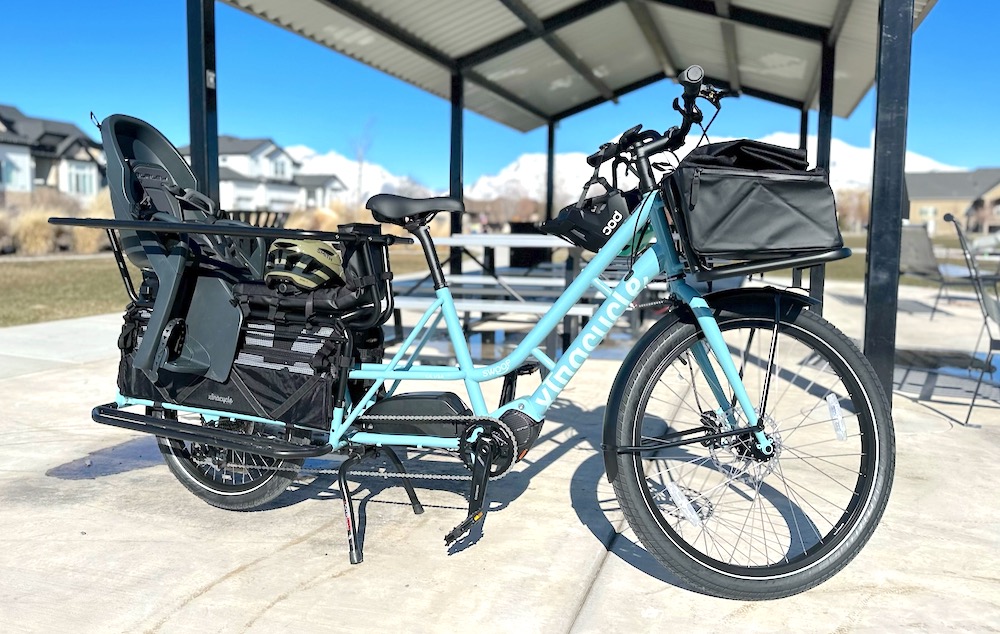 Xtracycle Swoop with the a storage bag up front and pannier in back