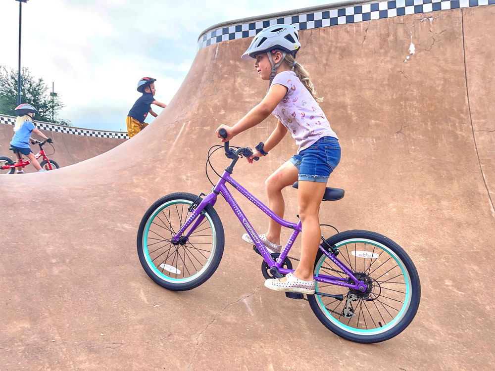 6 year old girl riding Guardian 20 inch bike with gears