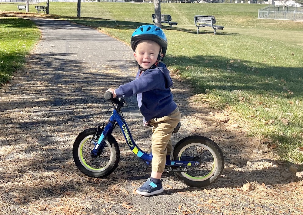 toddler riding his Guardian 14 balance bike