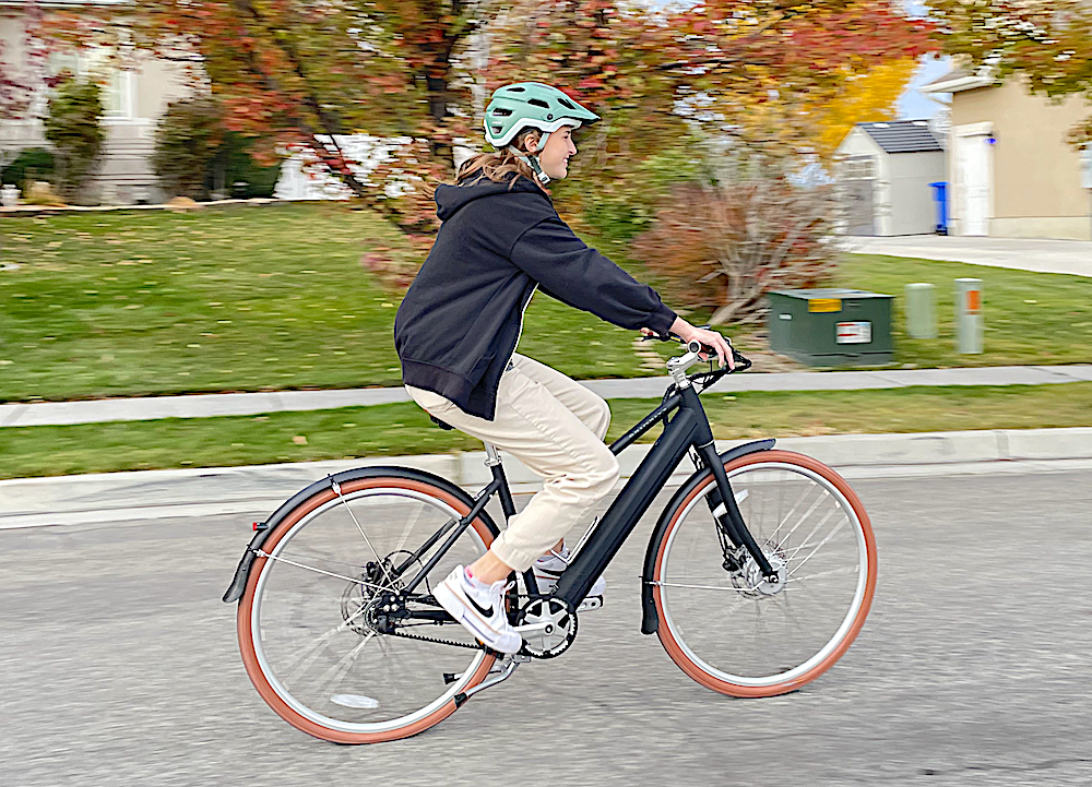 woman riding the Priority classic bike