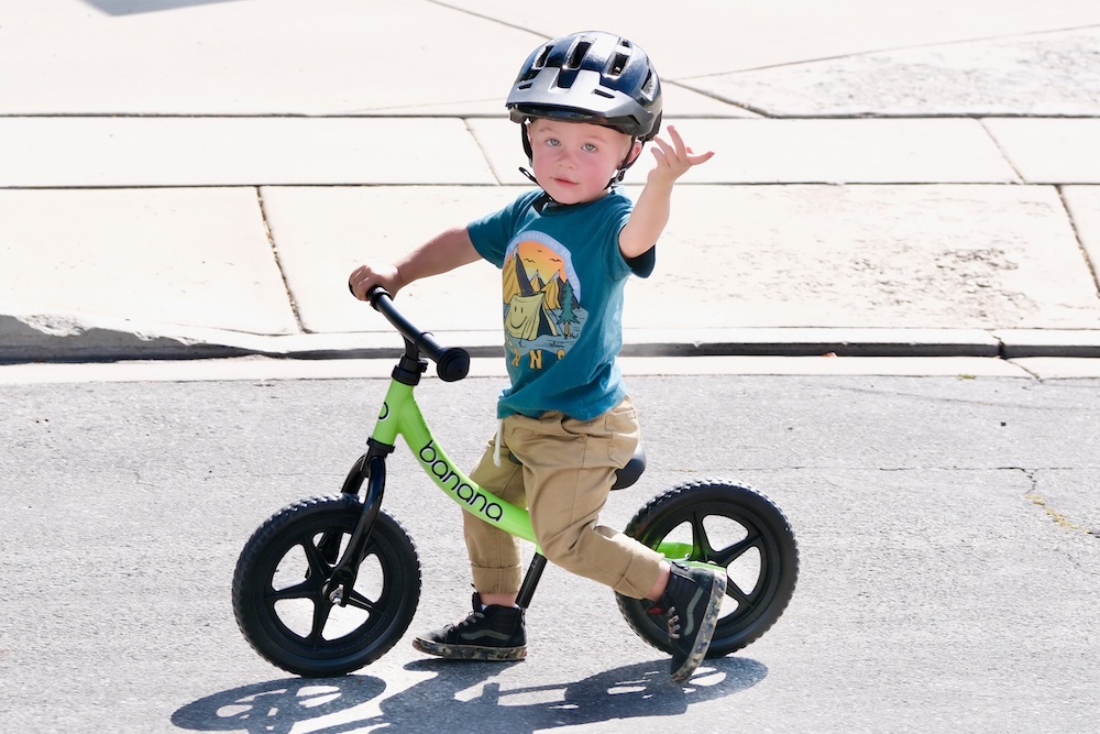 young boy walking on the Banana Bike GT balance bike