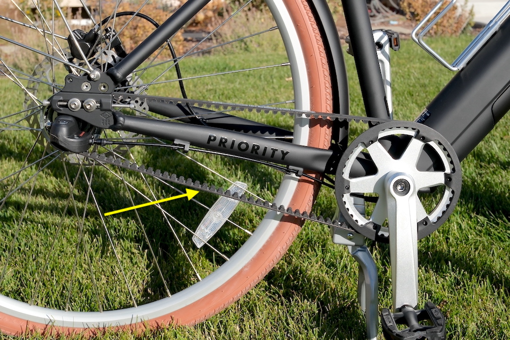 arrow pointing at the Gates carbon belt drive