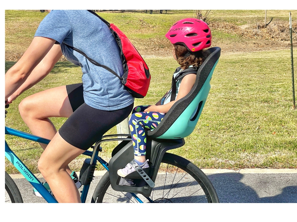 Thule Yepp Nexxt 2 Maxi from the side, showing swooped back seat top that allows room for the helmet