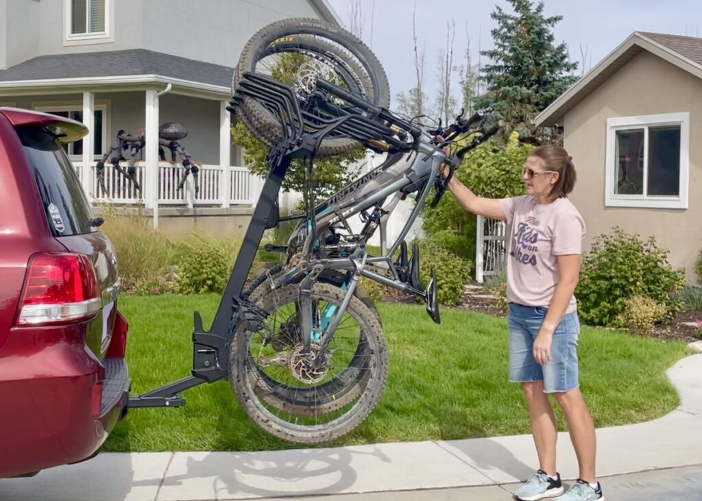 Pushing up a fully loaded Thule ReVert vertical bike rack