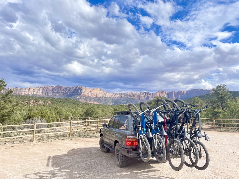 alta superior rack fully loaded on a MTB trailhead