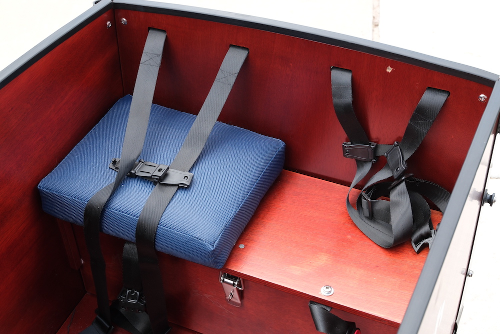 Padded seat next to a non-padded seat