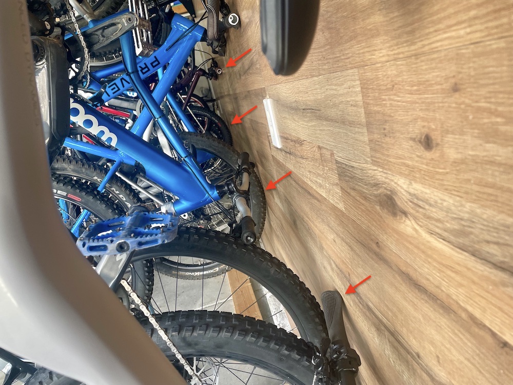 tires and handlebars hitting wall when on rack