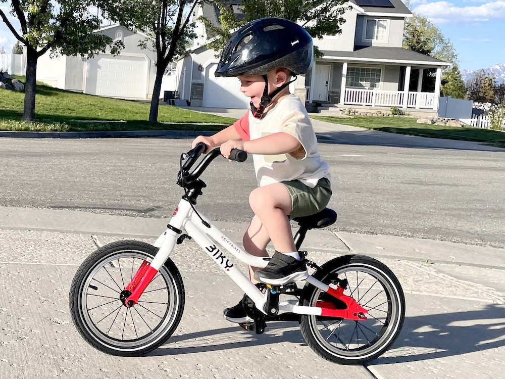 young rider having fun riding his bike