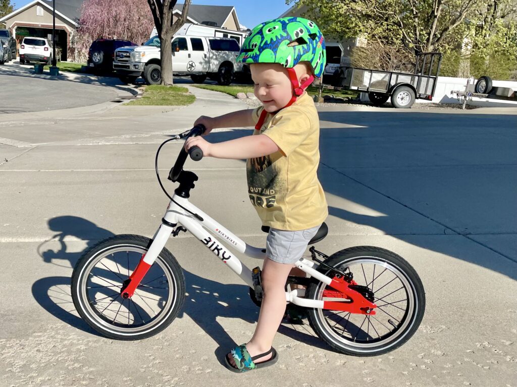 young rider sitting on the Biky Bikes with his feet flat