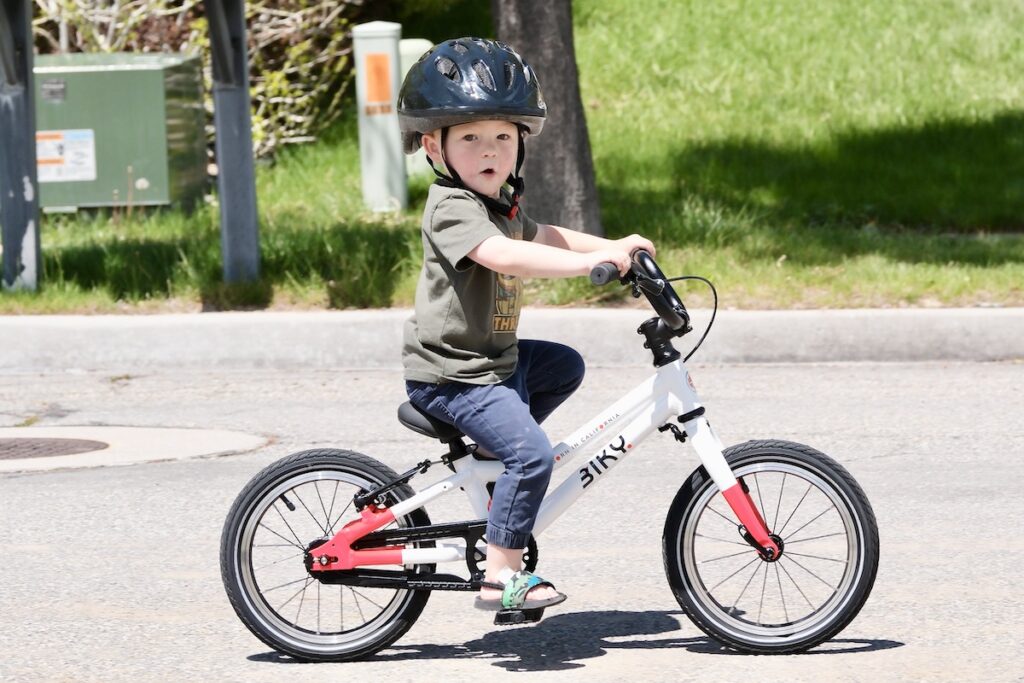 Young rider having fun on the Biky 14 bike