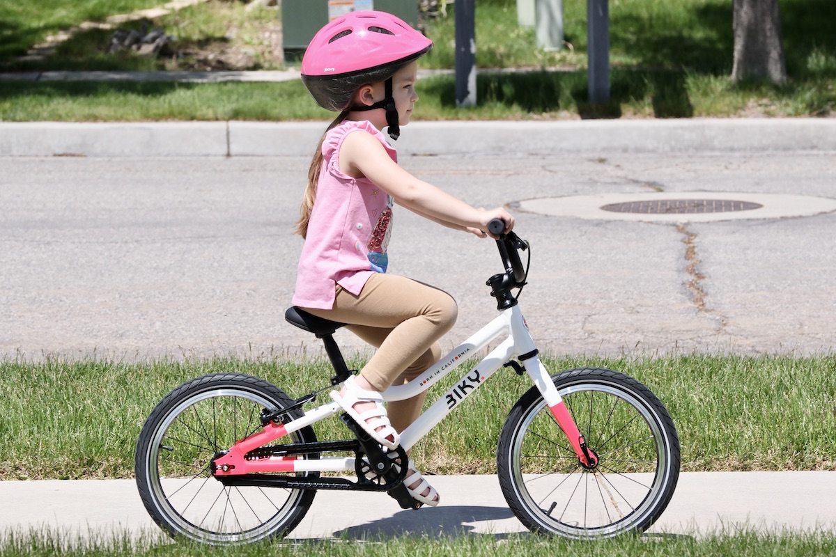 young girl riding the biky air 16 inch bike