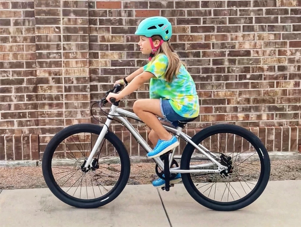 50.5" tall rider on Early Rider Belter appears to be a great fit