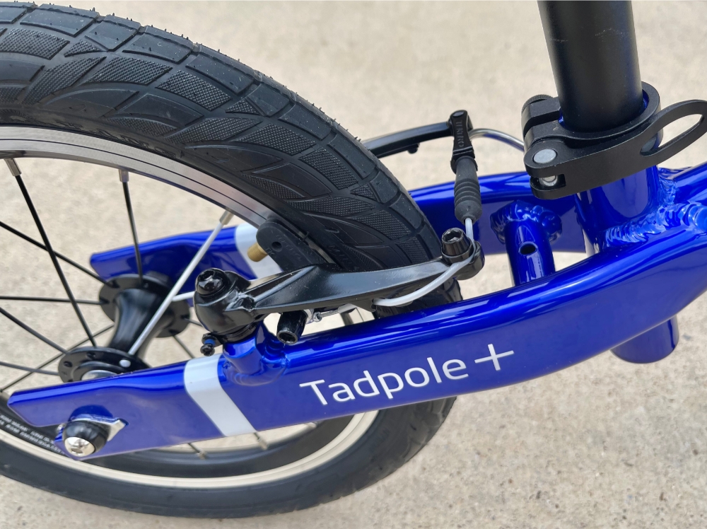 Tektro brake calipers on rear wheel of 14" Frog balance bike