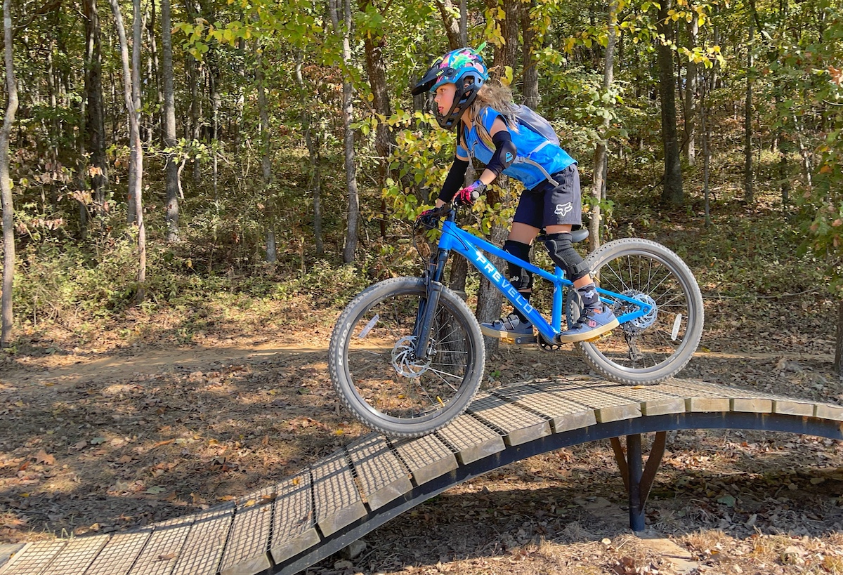 prevelo zulu four 24 inch mountain bike on wooden roller