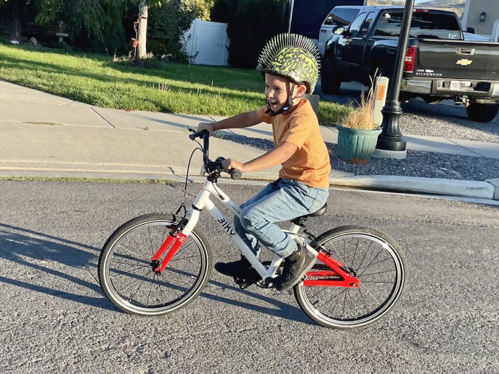 boy riding on the biky 20 kids bike