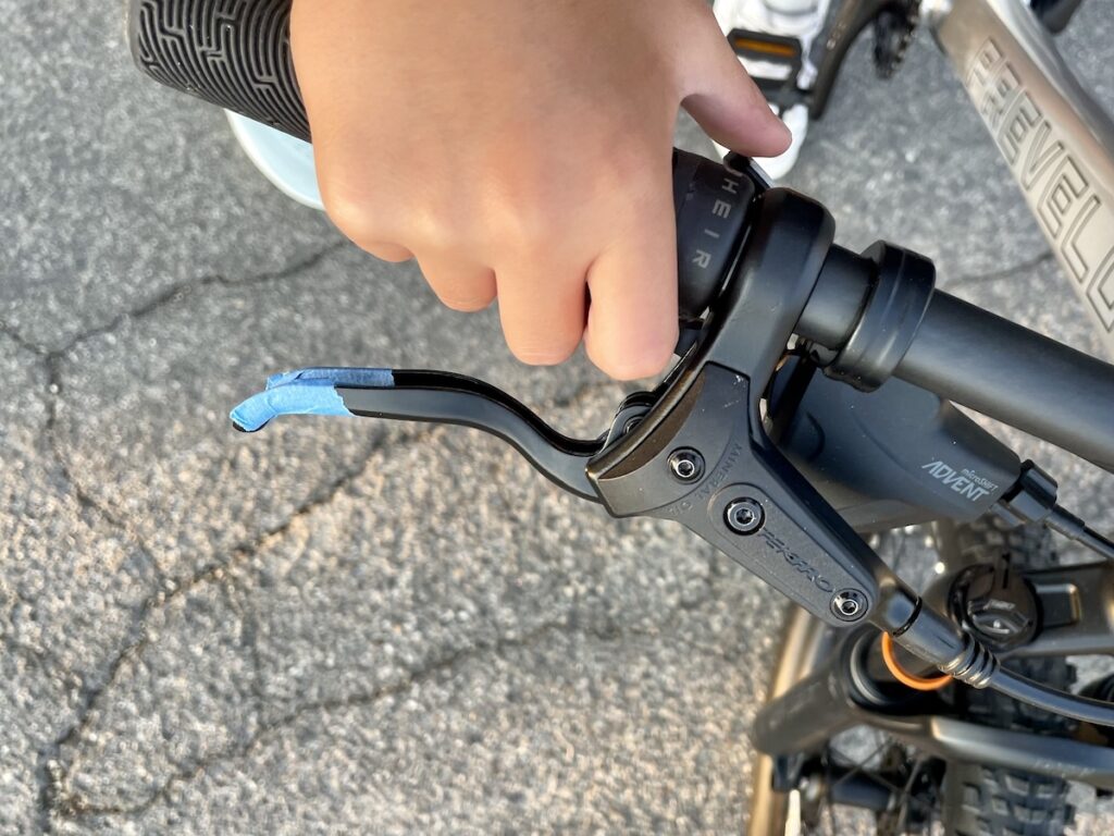 blue piece of tape on the Prevelo Zulu three right brake lever