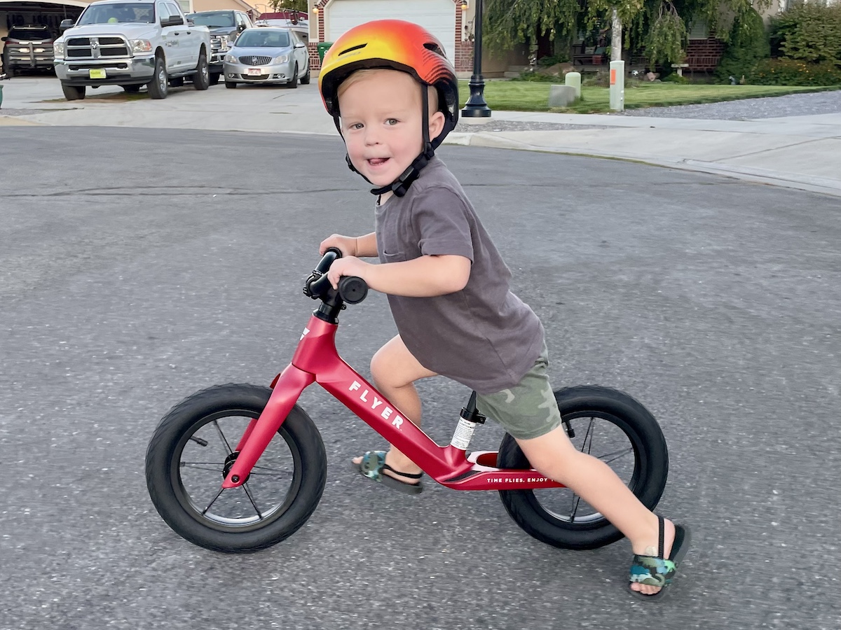 young toddler on a radio flyer balance bike