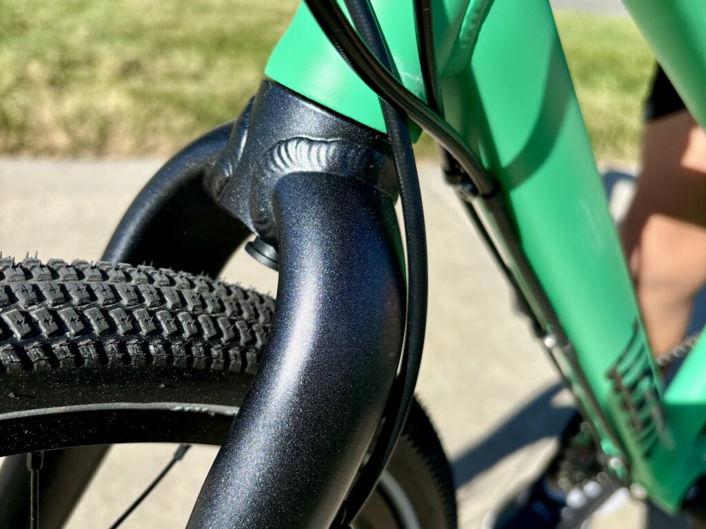 Shiny metallic paint on the fork of the woom 4 explore