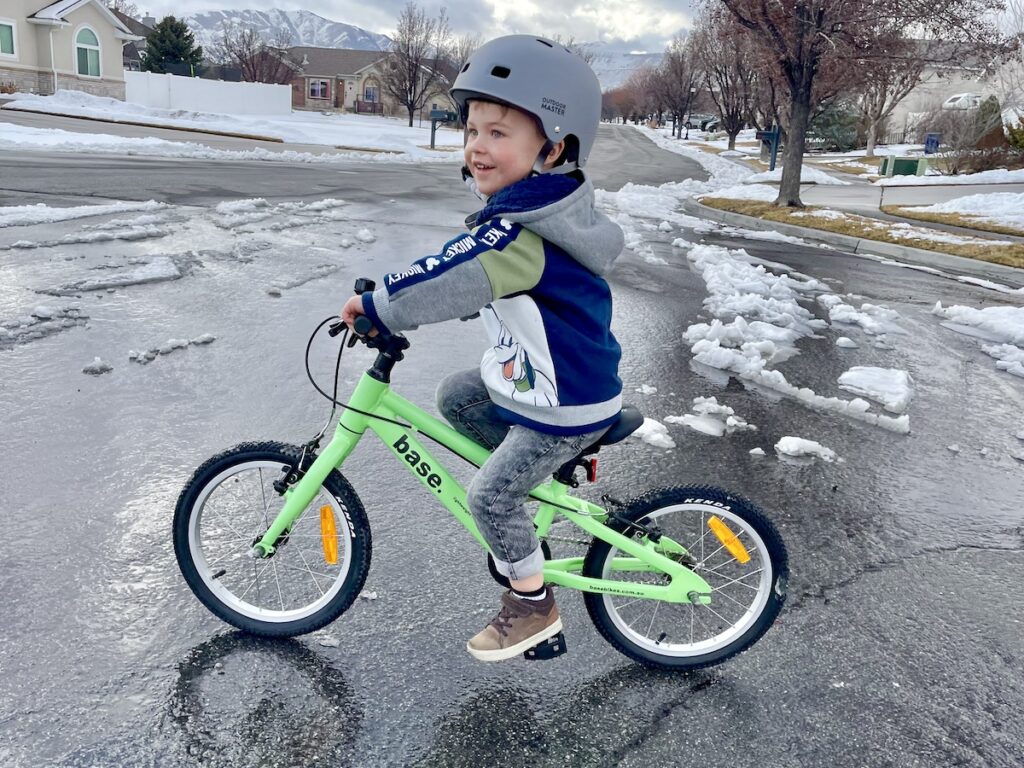 3 year old riding the base bikes 16 inch bike