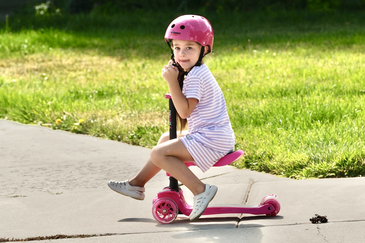 kid riding the hurtle scooter