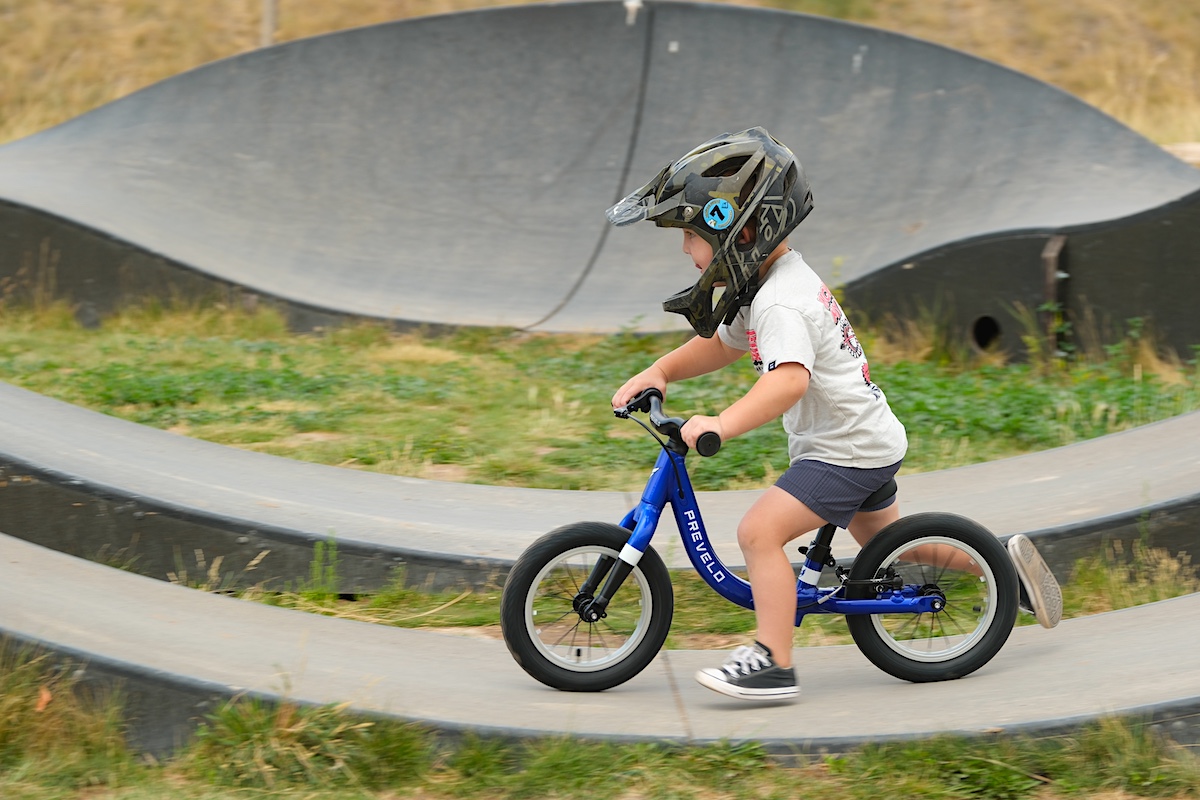 toddler on a Prevelo Alpha Zero balance bike at a bike park