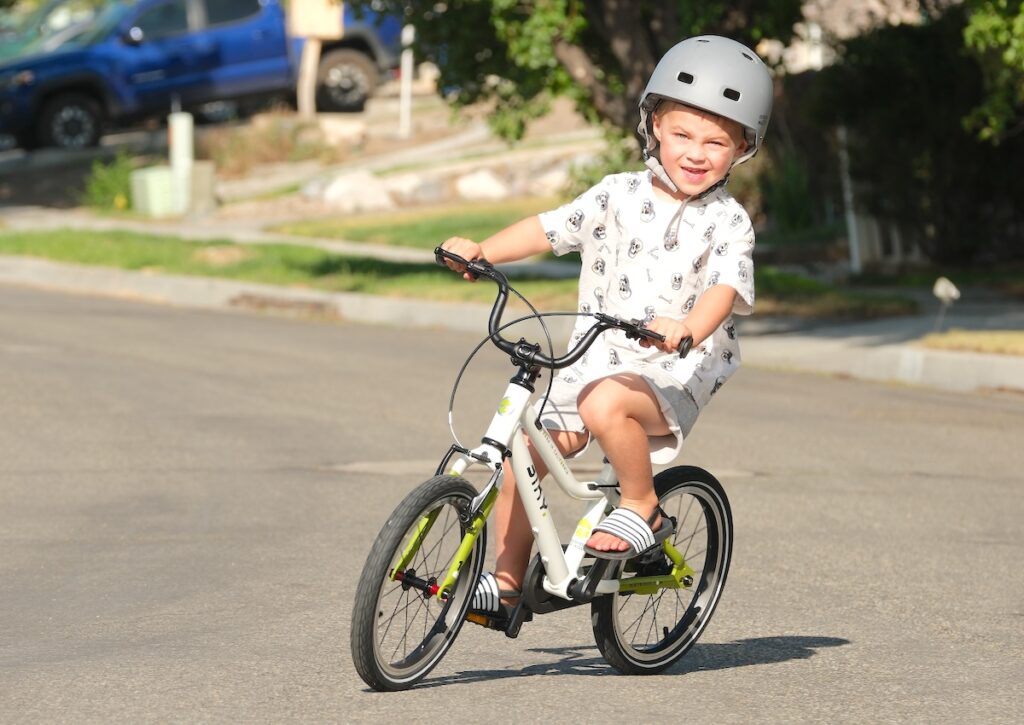 4 year old riding a biky air 16 inch bike