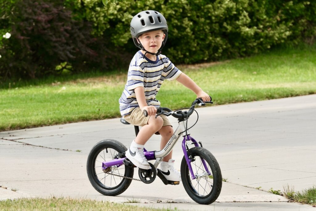 3 year old riding the littlebig pedal bike
