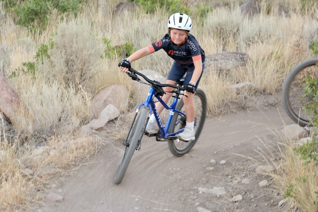 10 year old on PRevelo Alpha five downhill turn