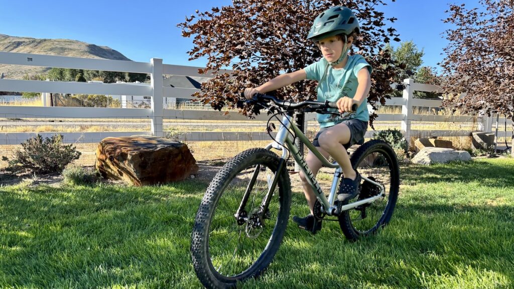 Prevelo Alpha Four on grass with an 8 year old