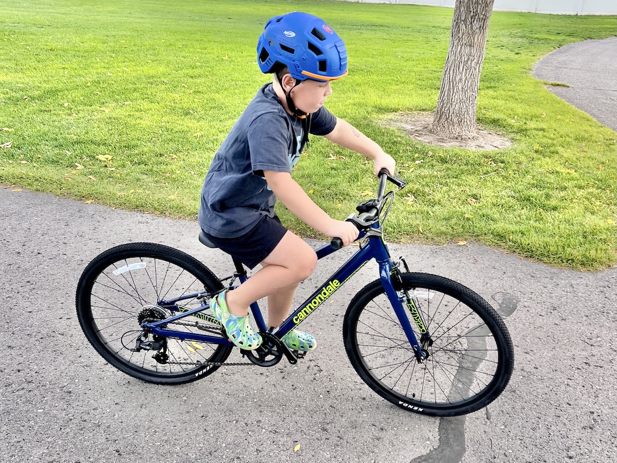 Young boy riding the Cannondale Quick 24 kids bike