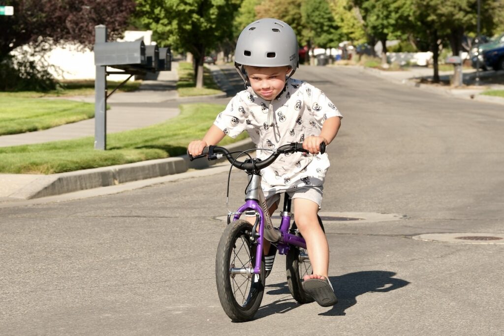 4 year old riding the littlebig as a balance bike